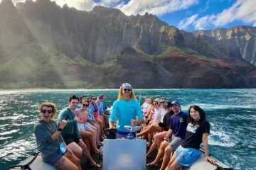 Mak being super stoked in front of kalalau KauaiNā Pali Ocean Raft Snorkel Tour · from $199Our most booked!